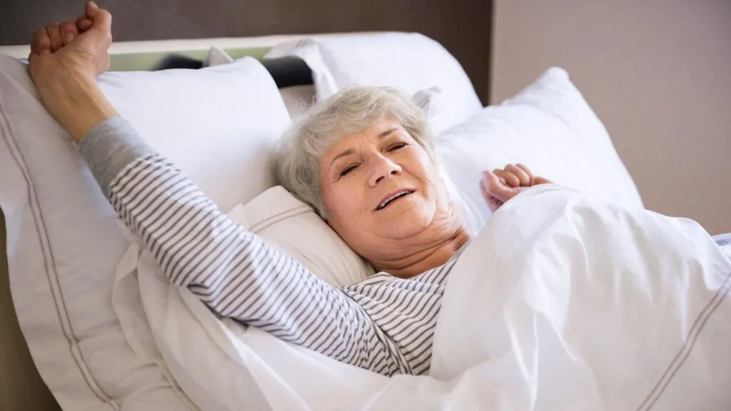 Senior resident waking up comfortably in a senior care home